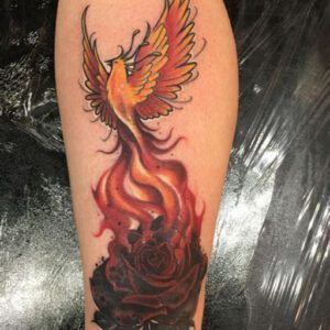 Phoenix Rising from the Ashes Tattoo Ideas